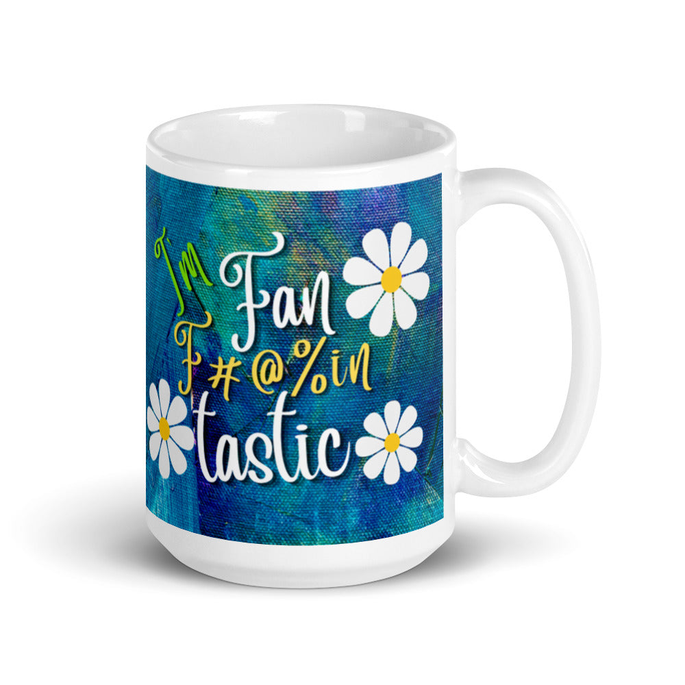 White glossy mug with blue and green textured background with the words I'm fan F#@% in Tastic